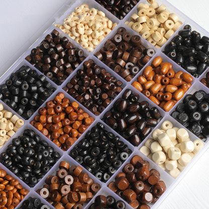 Mixed colour vintage solid wood beads scattered for DIY jewellery making and ethnic style craft projects