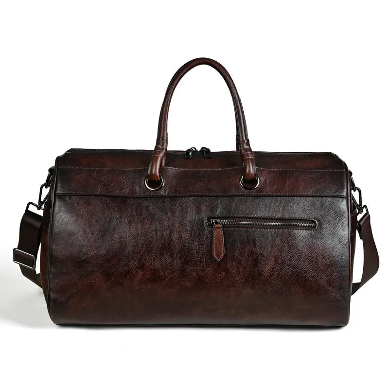Handmade brown retro leather tote bag with large capacity for travel.