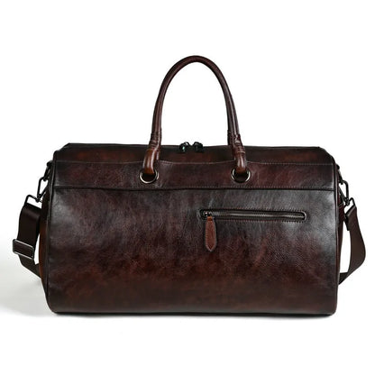 Handmade brown retro leather tote bag with large capacity for travel.