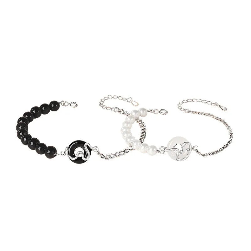 A New Chinese style 925 sterling silver couple's bracelet with snake zodiac detailing and a safe buckle clasp.