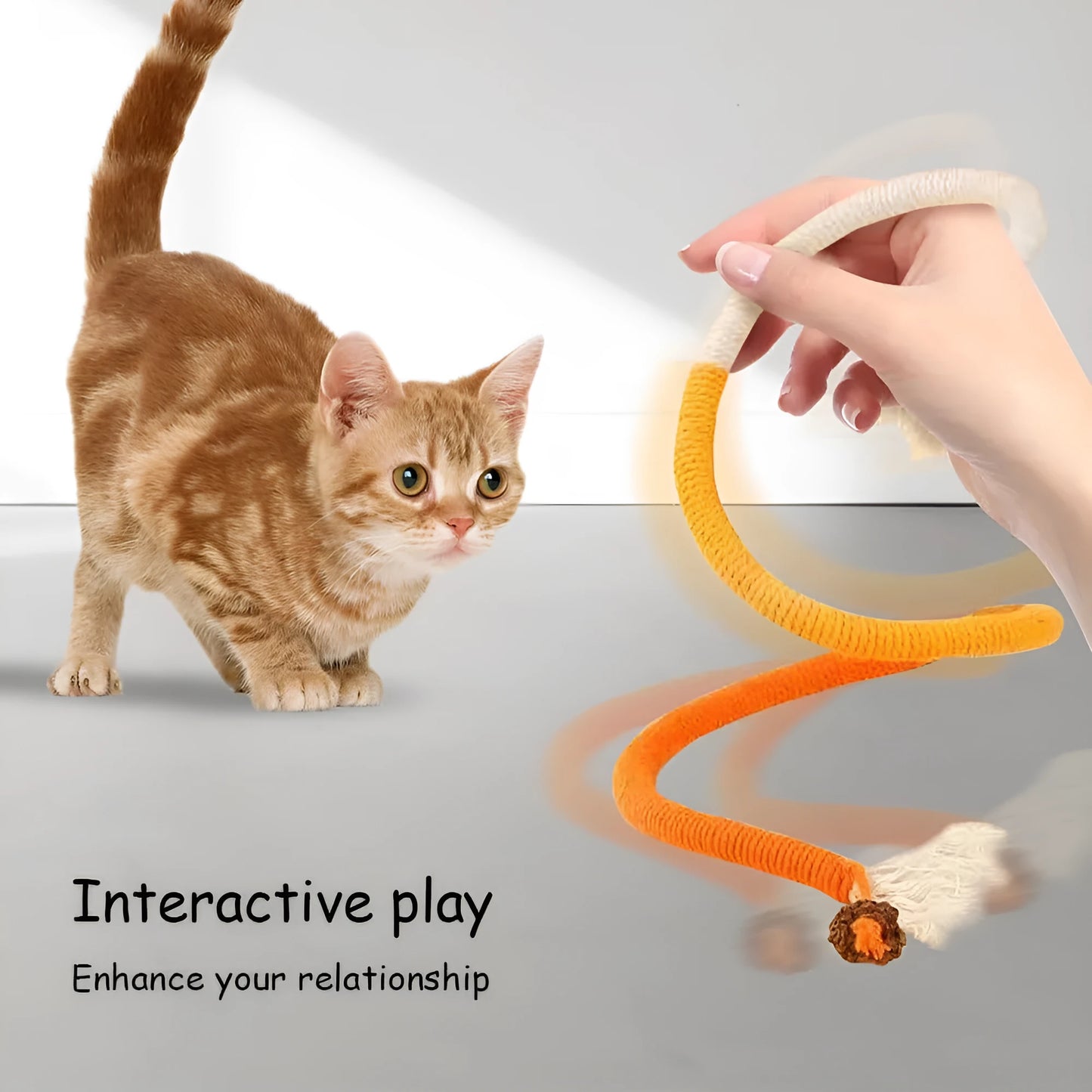A 70cm long cotton string cat bite rope toy in three colour options: purple, orange, and red with green.