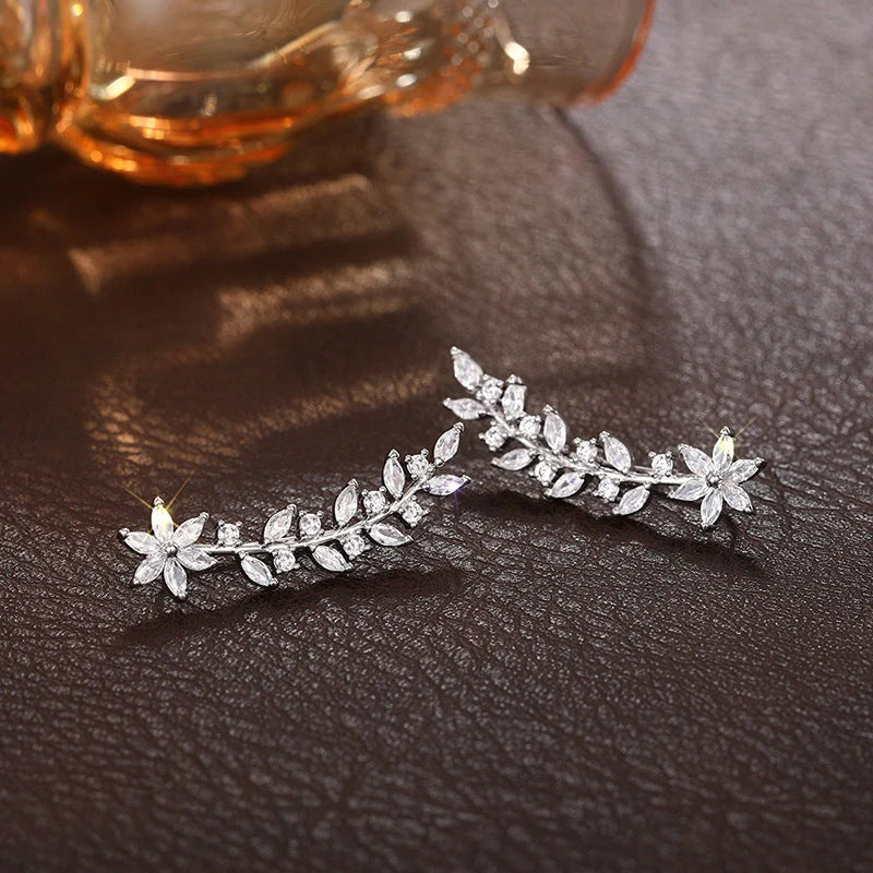 Exquisite diamond flower earrings for women in white gold, gold, and rose gold finishes
