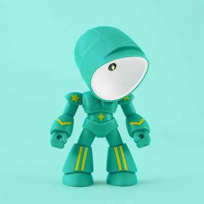 Mini mecha robot hero LED night light with adjustable arms on a desk.