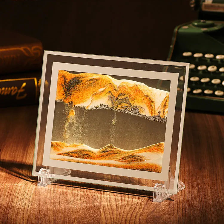 Geometric glass ornament containing a colourful quicksand landscape painting in modern style.