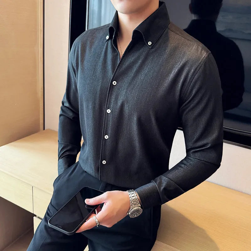 Men's slim fit long-sleeved denim shirt in black, shown on a model.