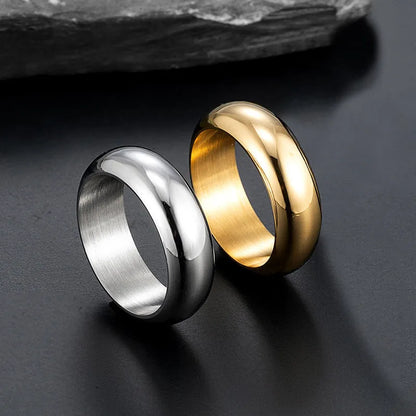 Glossy electroplated titanium steel ring in black, gold, or steel colour on finger