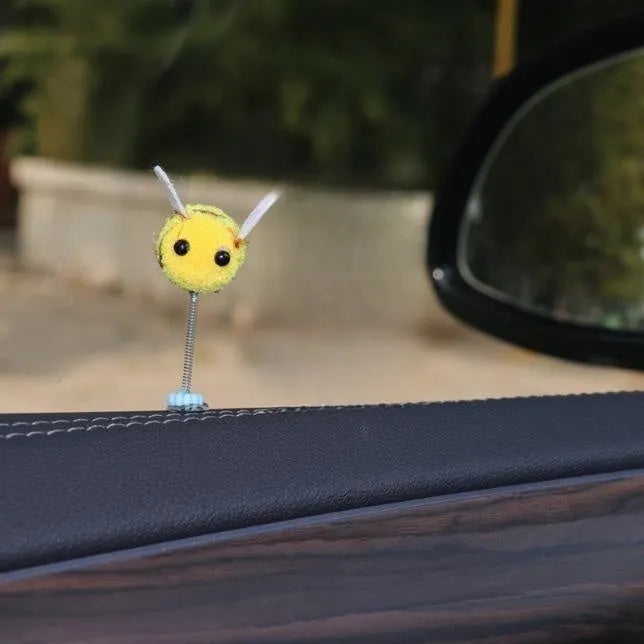 Swing Spring Bee cartoon fur ball car decoration measuring 3cm by 3cm