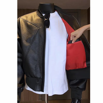 Man wearing a long black PU leather jacket with a litchi grain texture, showing its extended 100cm length and tight fit.