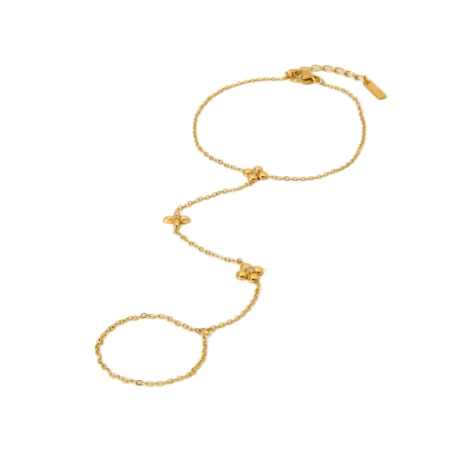 Gold stainless steel women's bracelet with geometric design of eight pointed stars and flowers.