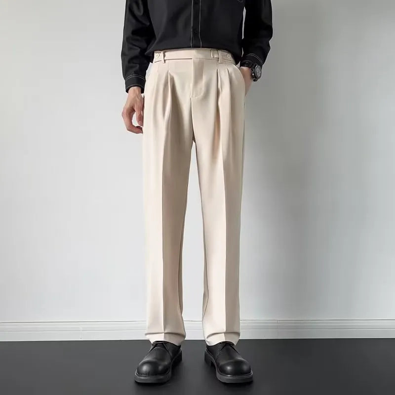 Men's straight-fit loose trousers in apricot colour on a hanger, showing the full length and classic cut.