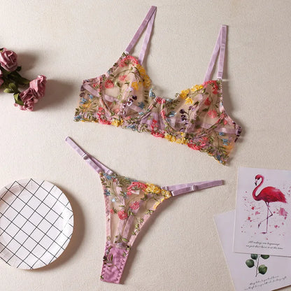 Floral mesh bra and T-back underwear set in skin colour on a mannequin