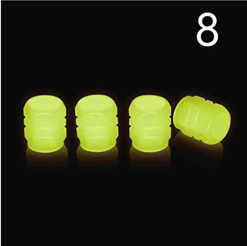 Glow-in-the-dark rubber tyre valve caps in five colour options on tyre valve stem