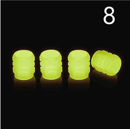Glow-in-the-dark rubber tyre valve caps in five colour options on tyre valve stem