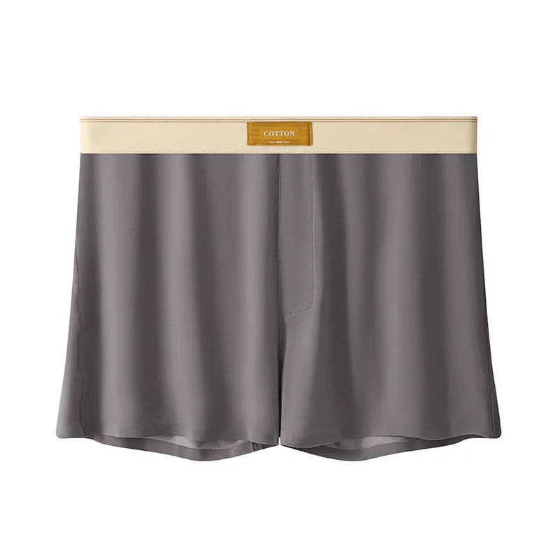 Pack of three pairs of solid colour men's ice silk briefs on a white background