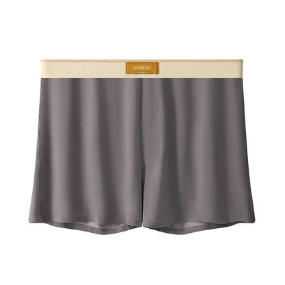 Pack of three pairs of solid colour men's ice silk briefs on a white background