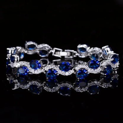 Copper-plated gold bracelet with AAA+ zircon stones in simple geometry style measuring 18.4cm length