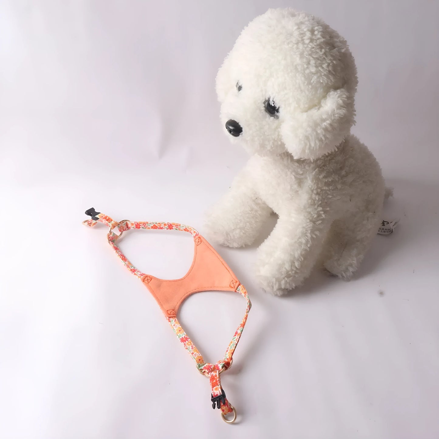 Orange cloth dog harness and leash set from the floral series, showing the single chest back design.