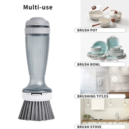 Milk white and mint green pot scrub brush with a soap dispenser handle and replaceable non-scratch bristles.