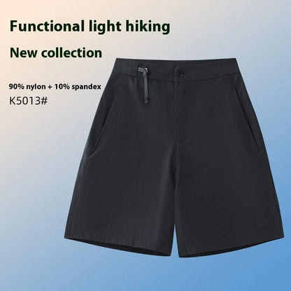 Men's khaki sports shorts with quick-drying fabric and elastic waist for running and climbing activities