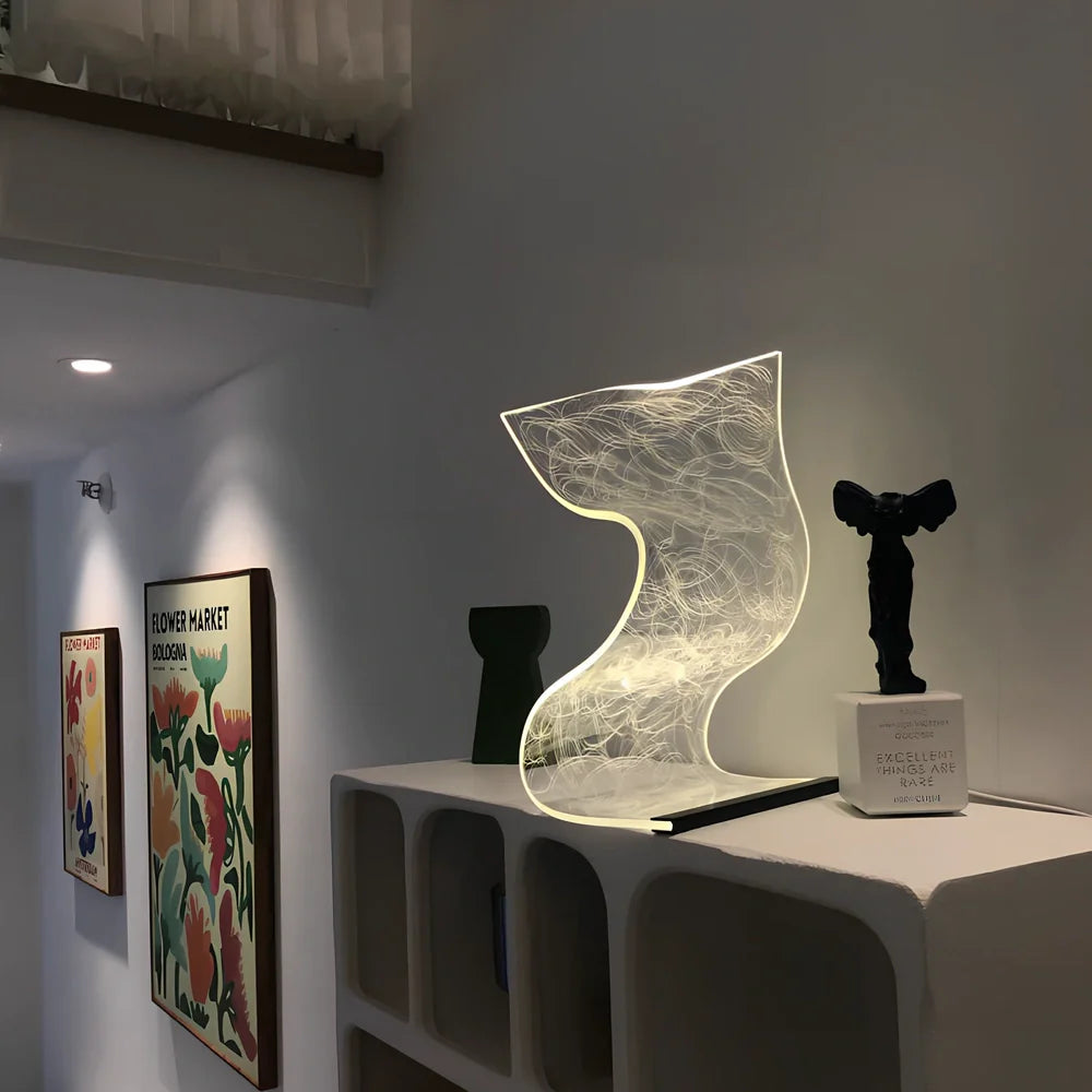 USB-powered bedside lamp with three colour settings and compact design