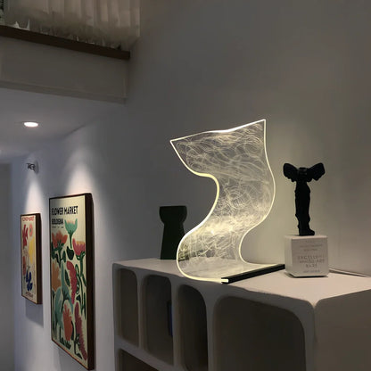 USB-powered bedside lamp with three colour settings and compact design