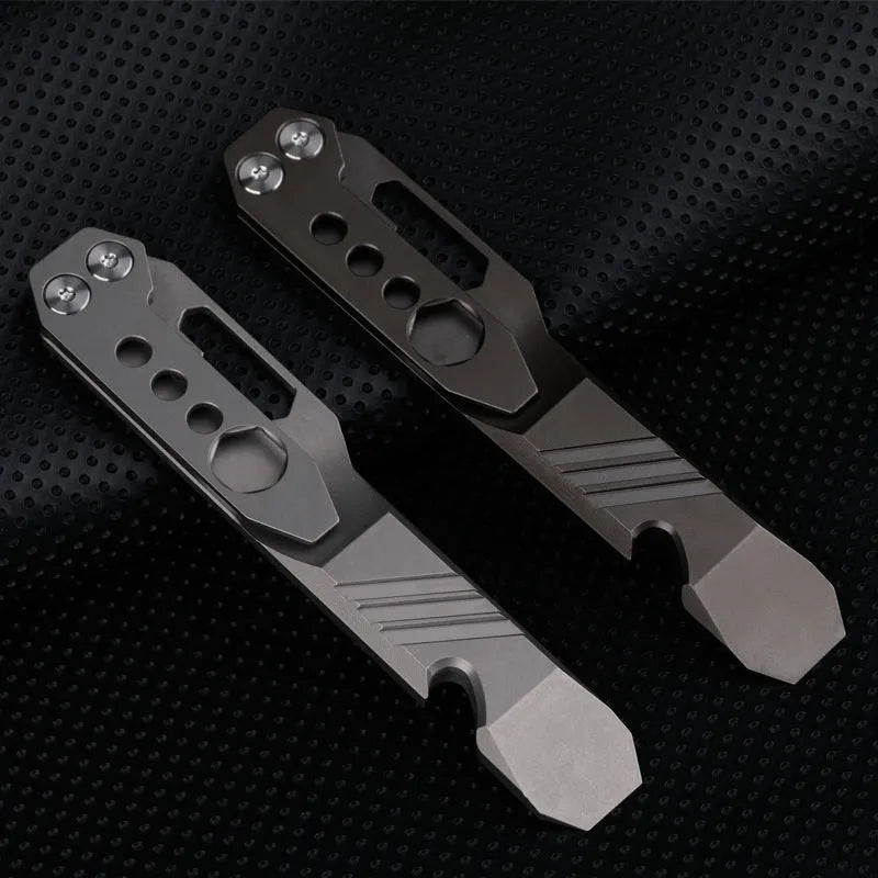 Titanium alloy multi-function crowbar tool with bottle opener on a stone wash finish background.