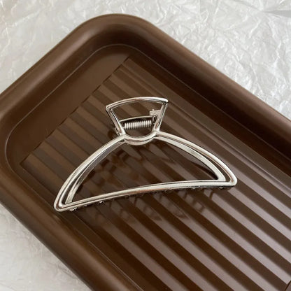Silver metal hair claw barrette example from a range of 44 Korean-style designs.