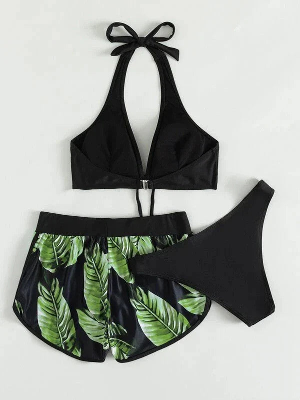 A stylish 3-piece leaf print bikini set with matching shorts, available in a variety of vibrant colors and patterns