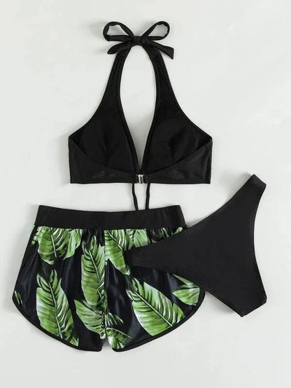 A stylish 3-piece leaf print bikini set with matching shorts, available in a variety of vibrant colors and patterns