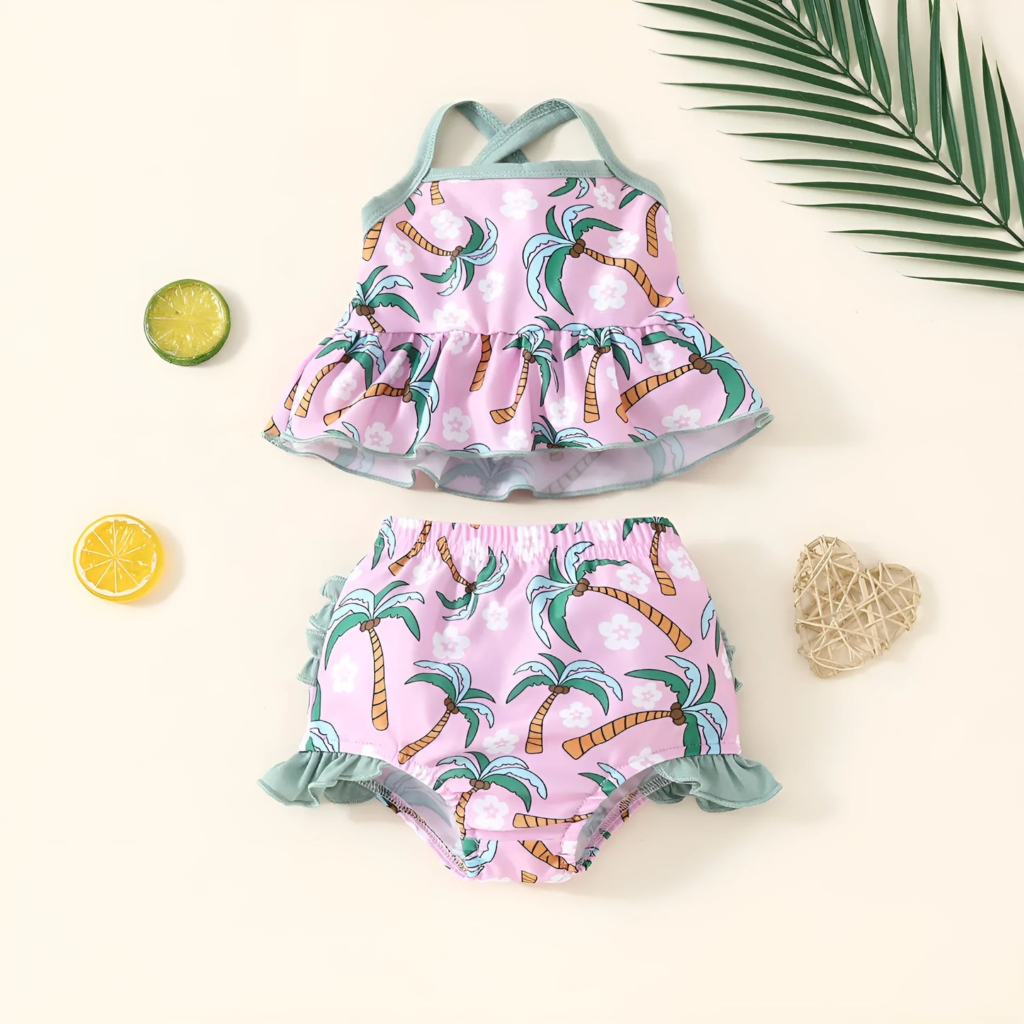 White polyester two-piece swimsuit set with top and shorts for a baby or toddler.