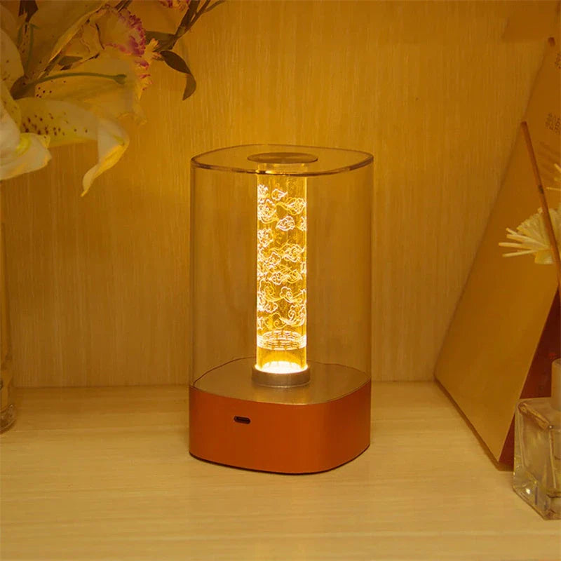 Elegant touch-controlled bedside lamp with soft, warm lighting, unique lamp post design, and wireless USB charging