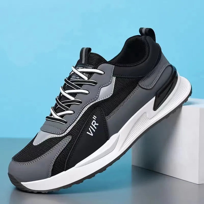 Men's colour block mesh sneakers in black, grey, and white with lace-up front and low-top design