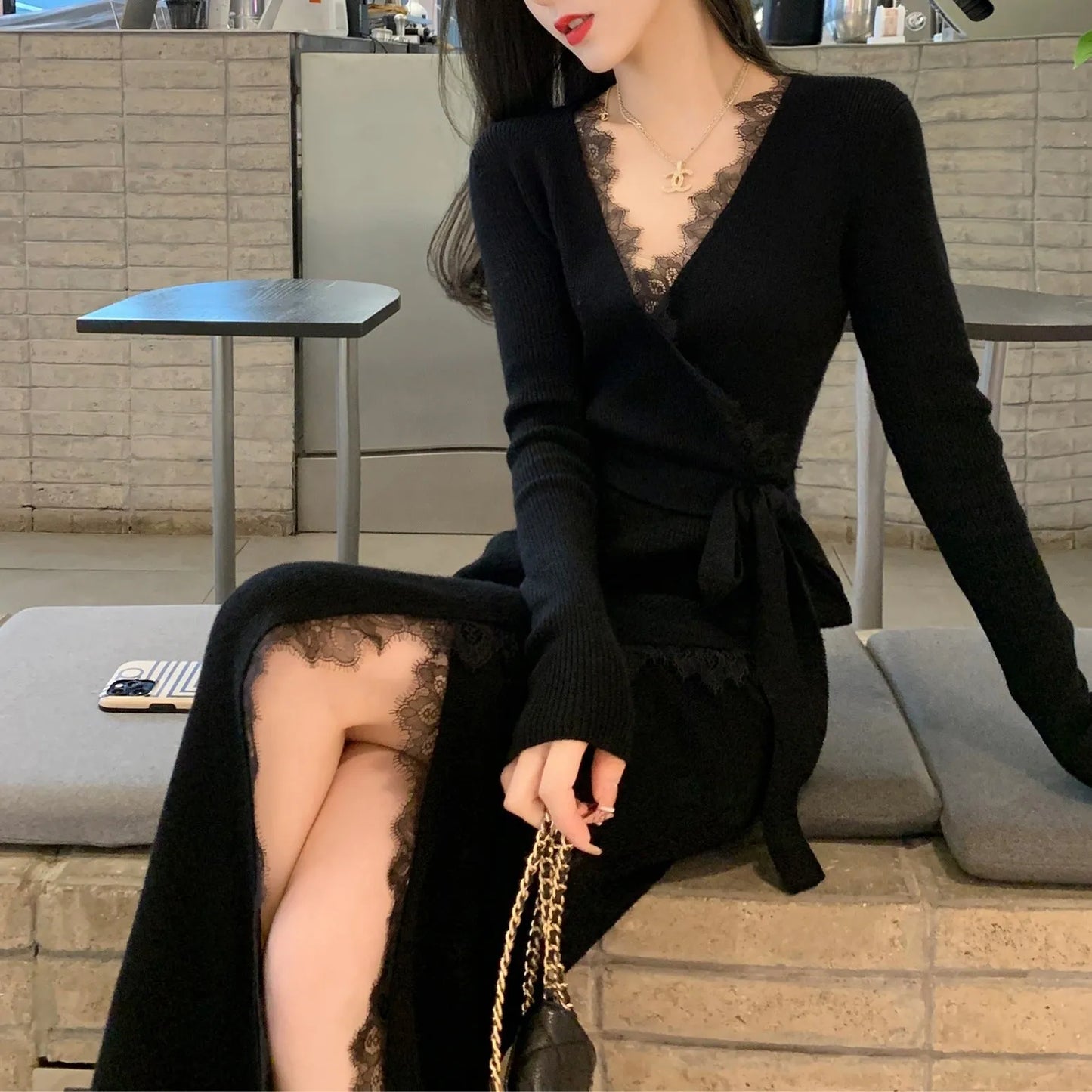 Black solid-colour princess dress skirt with slim fit silhouette on mannequin