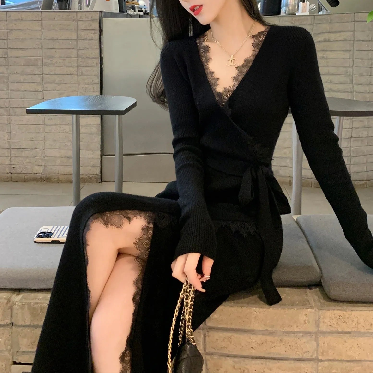 Black solid-colour princess dress skirt with slim fit silhouette on mannequin