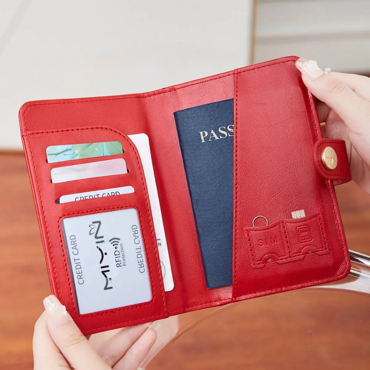 PU passport wallet with sewing line detail, shown in multiple colours including black, pink, and blue, featuring anti-theft swiping protection.