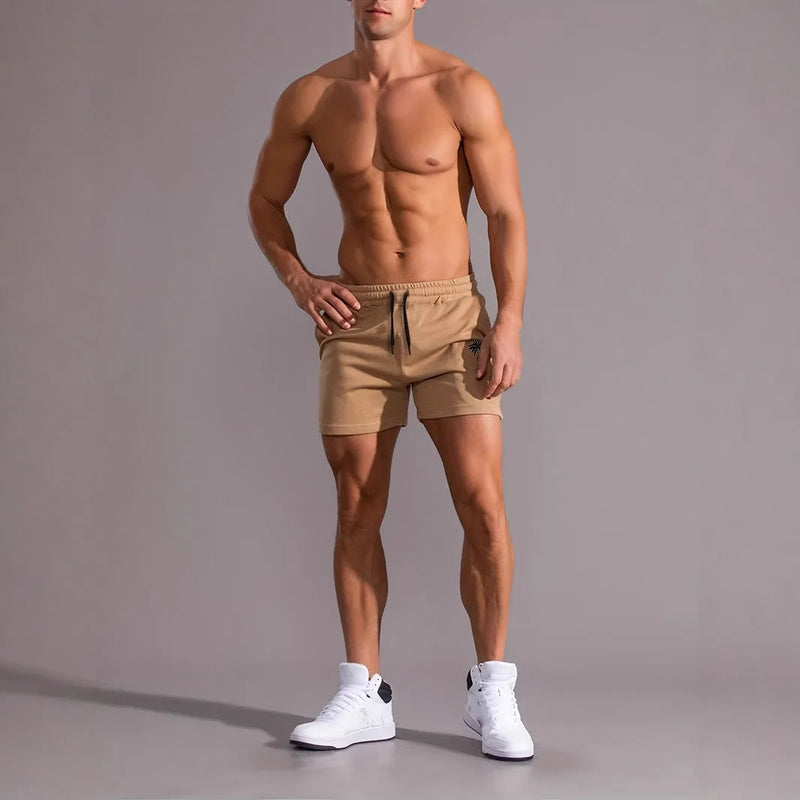 Men's casual shorts in straight-leg sports style featuring an elasticated waistband, polyester fabric with a printed coconut pattern, available in khaki colour across S to 2XL sizes, suitable for summer wear