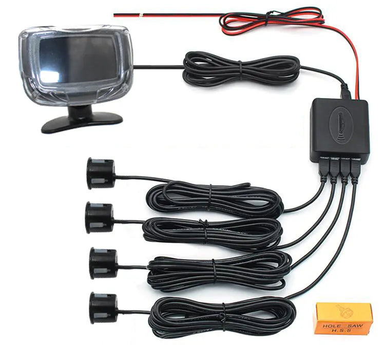Wireless reversing sensor system showing main display unit, four embedded probes, and installation accessories.