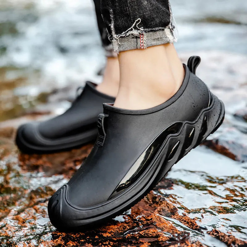 Men's short rain boots, plastic waterproof casual wellingtons in solid colour design, available in black, green, and grey colourways, sizes 39 to 44 for UK men's footwear.