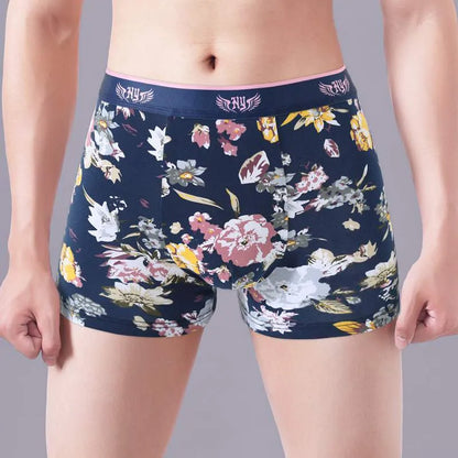 Men's cotton boxer shorts with floral print, showcasing the U-shaped convex design and mid-waist fit.