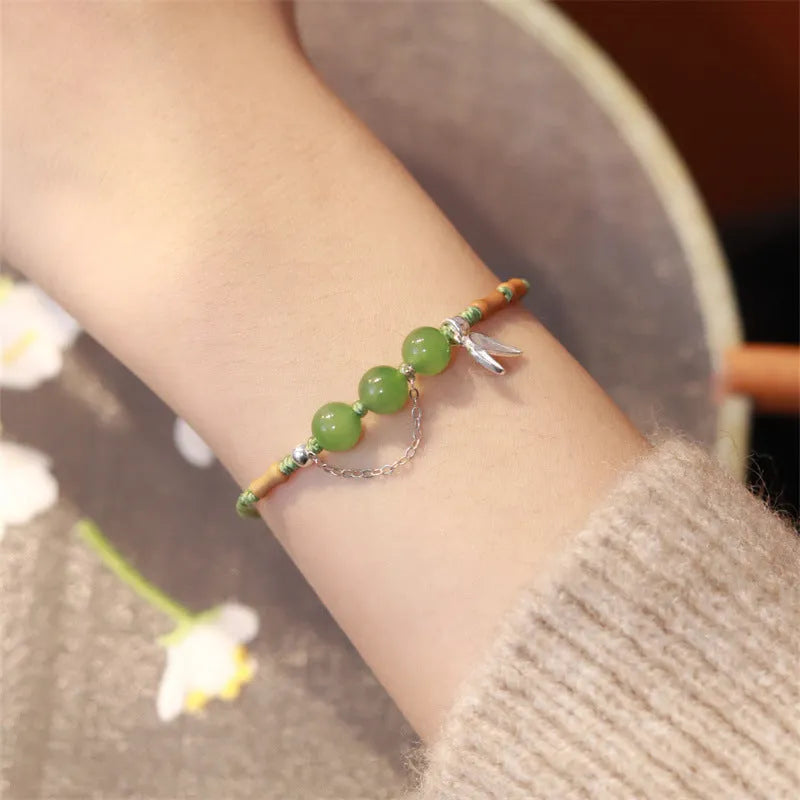 Hetian jade chalcedony bracelet with woven strap in diamond design with lotus detail