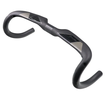 Matt carbon fibre road bike drop handlebar showing bent shape and clamp area.