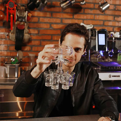 Transparent six-shot glass dispenser rack with individual covers on a wooden bar