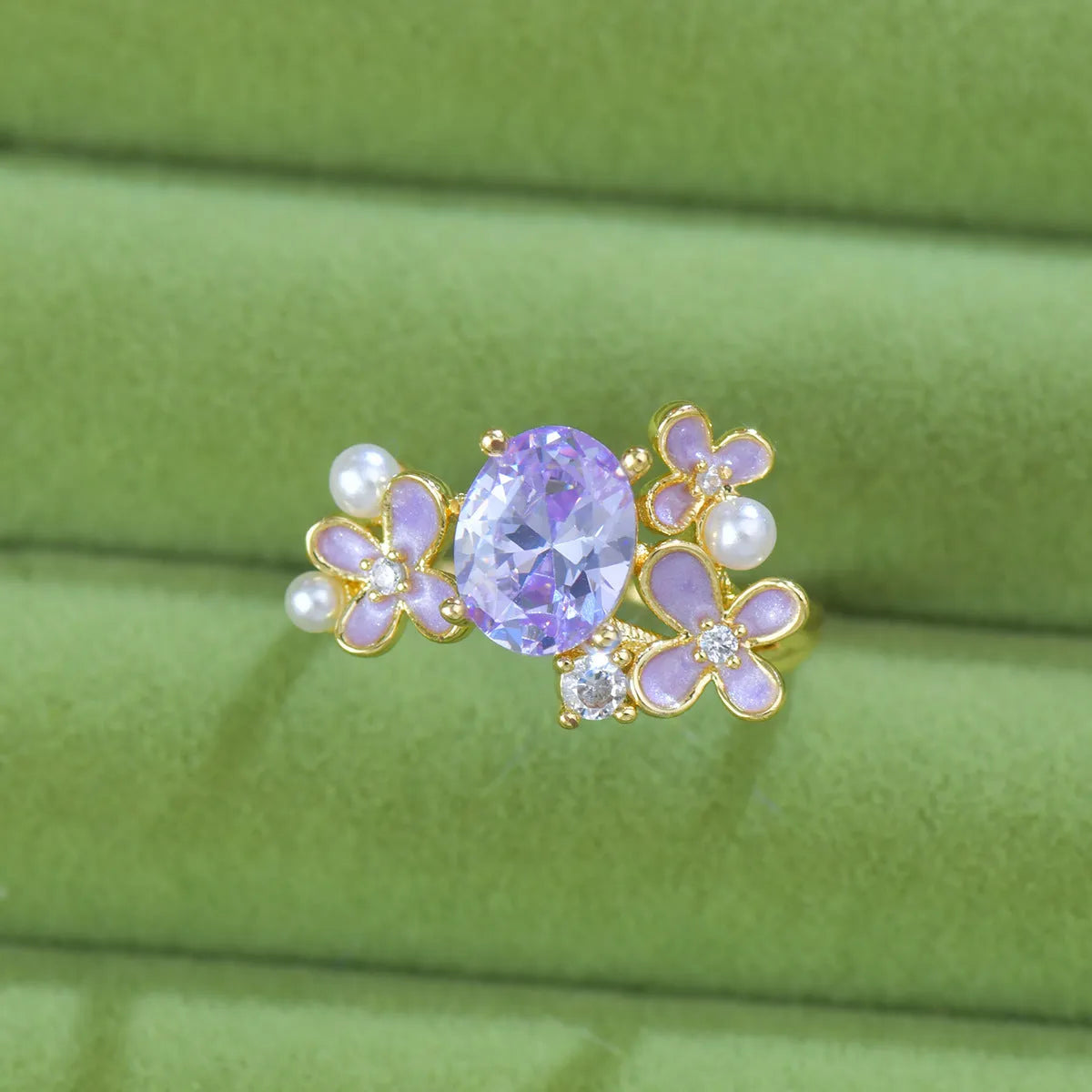 Women's adjustable open ring with flower and pearl design in yellow or light purple electroplated metal