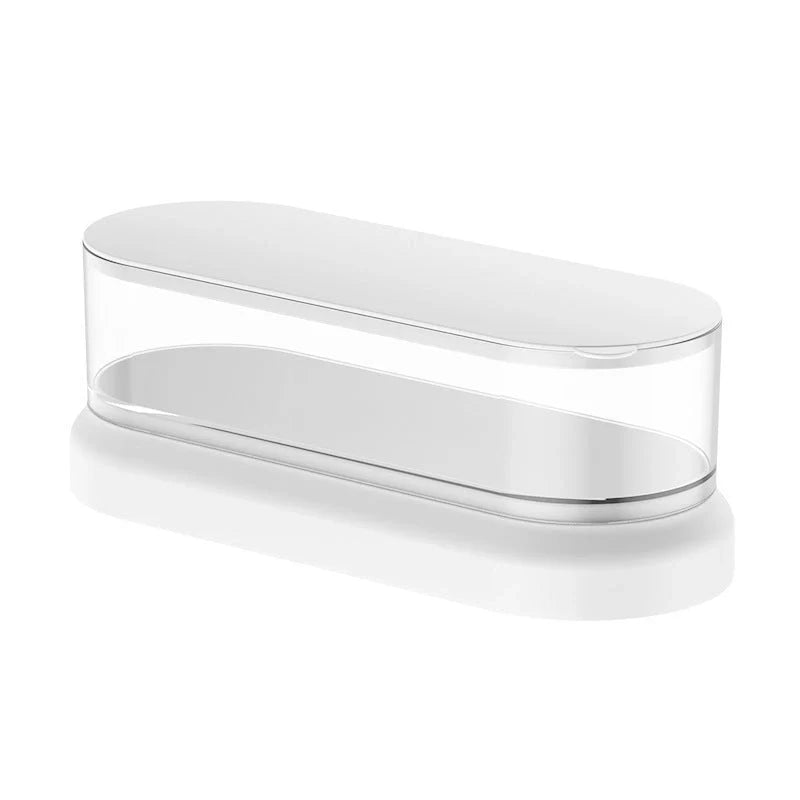 Compact ultrasonic cleaning machine for watches and small items, white colour, on a table