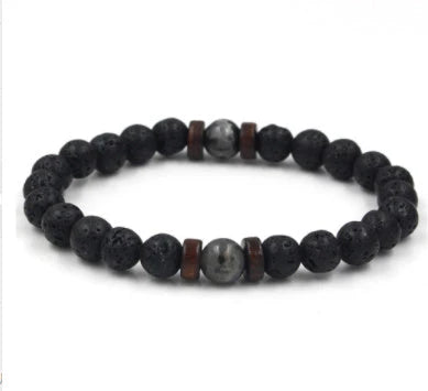 A stylish and durable men's bracelet made with volcanic stone, flash stone, and wood chips