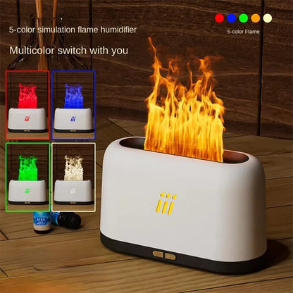 Black ultrasonic flame aroma diffuser humidifier with LED lights on a wooden table