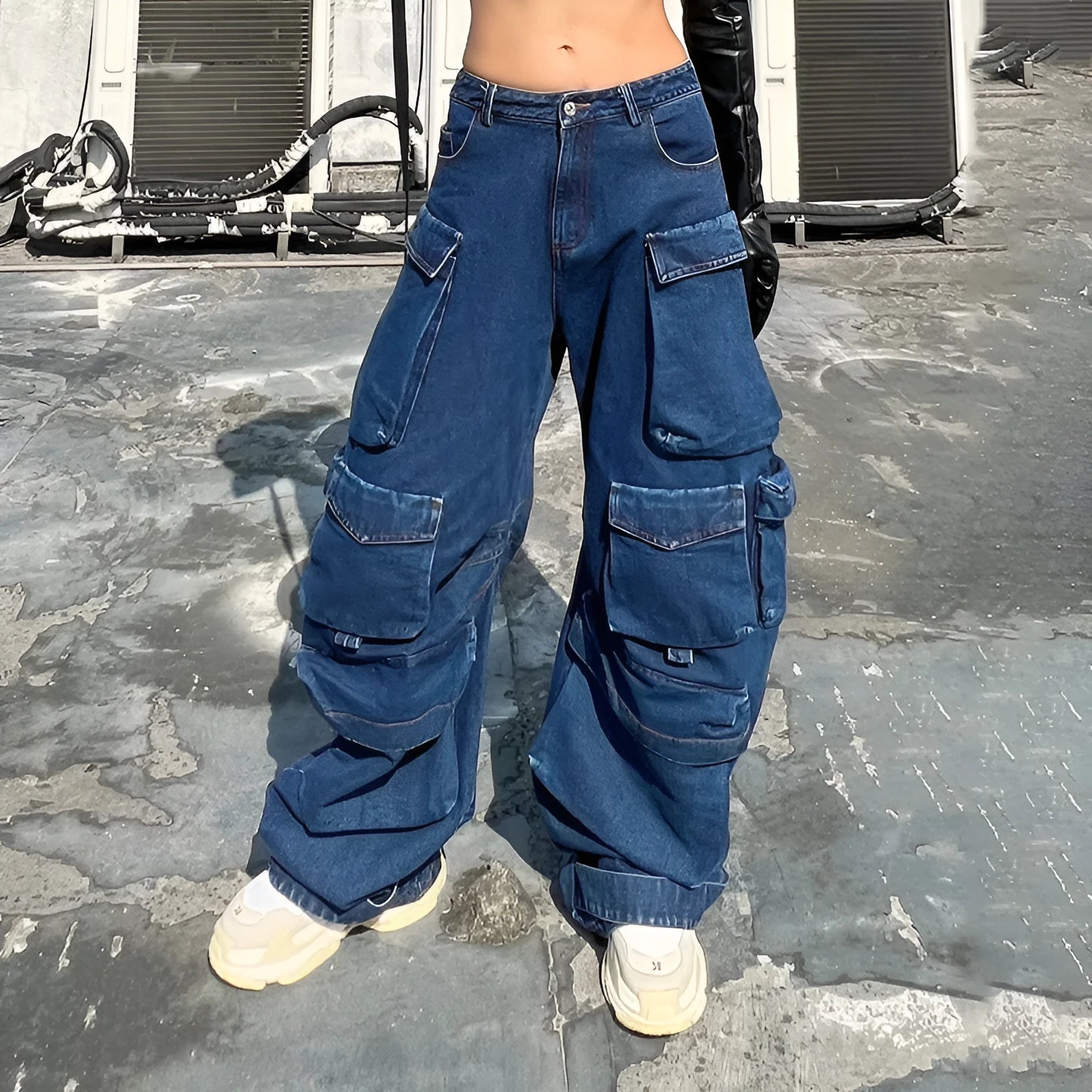 Dark blue distressed wide-leg women's jeans with high waist and multiple pockets on cotton denim fabric