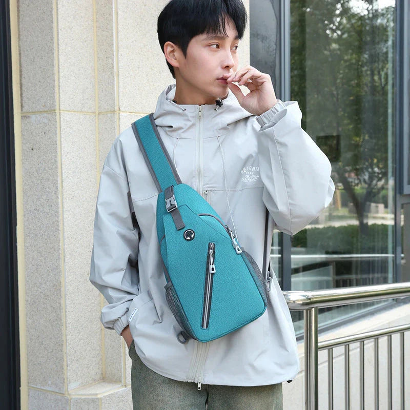 Rugged canvas crossbody bag for men in various colors, featuring a spacious main compartment, adjustable shoulder strap, and multiple pockets for organized storage.