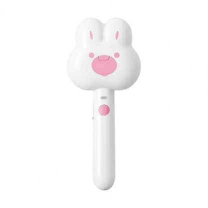 Rechargeable pet steam grooming comb in green, pink or white with cartoon design