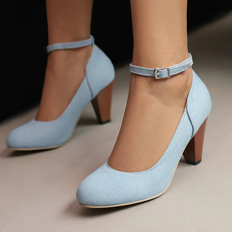 Women's denim platform heels with buckle closure, featuring a waterproof platform, thick 6-8cm heel, shallow round-toe upper, and available in multiple shades of blue and black.